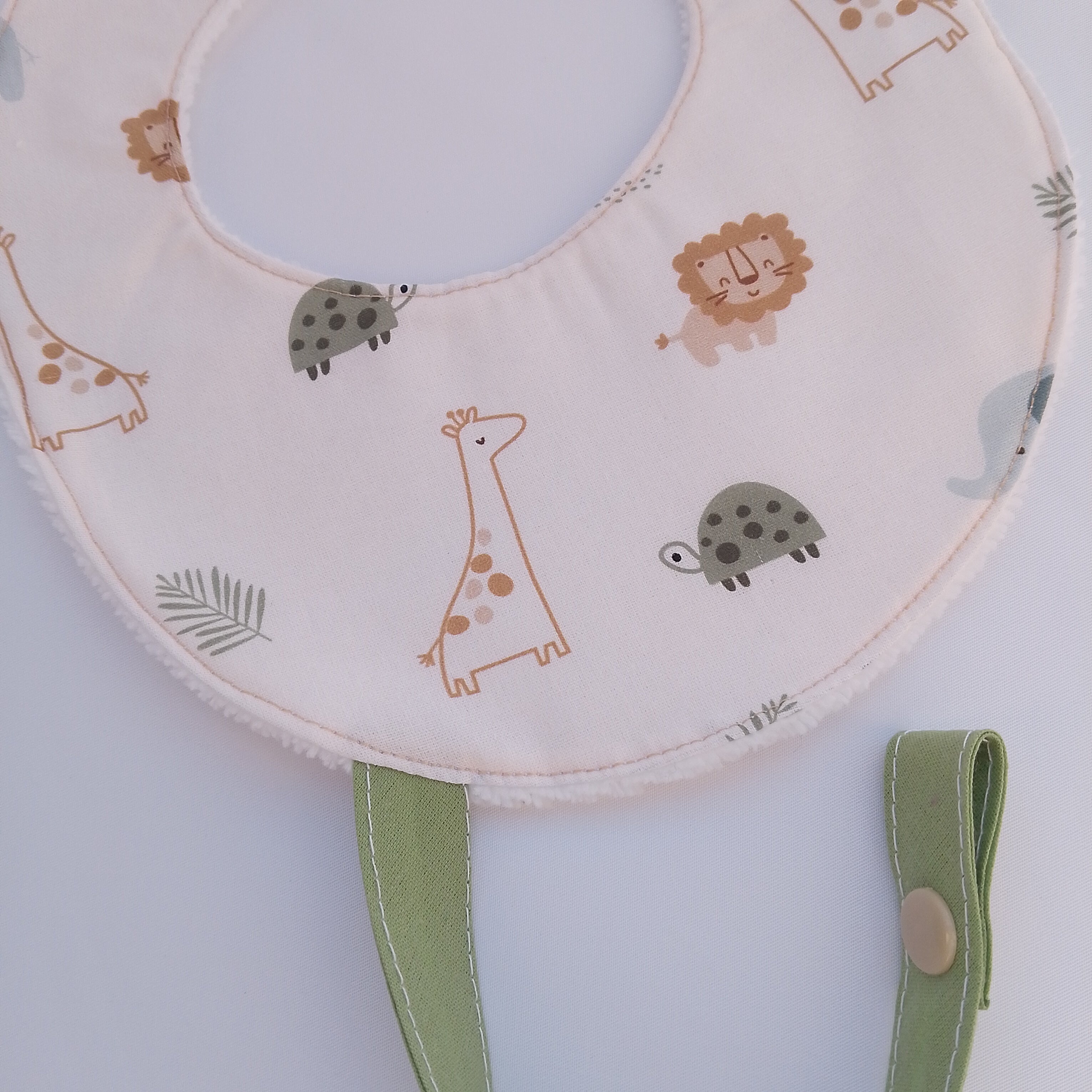 Babero con cinta Chupetero